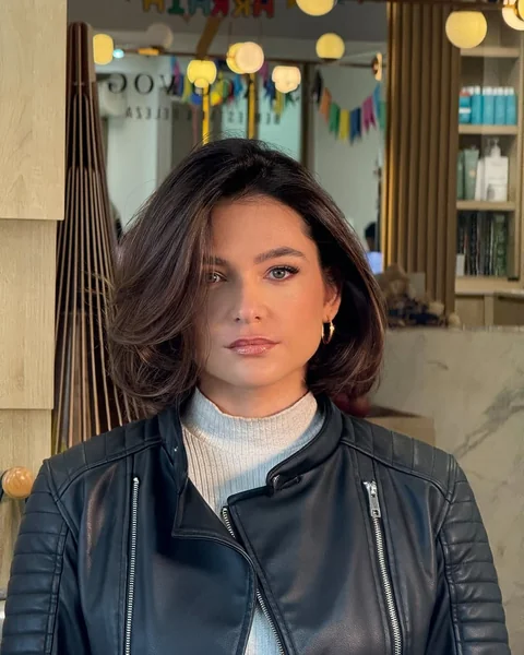 Voluminous Deep Brunette Bob with Retro Bounce