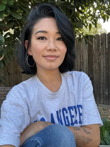 Voluminous Jet Black Italian Bob with Side Sweep