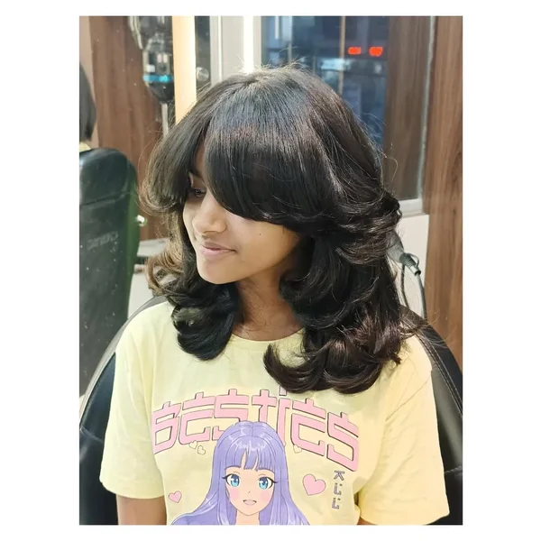 Voluminous Raven Wolf Cut with Bombshell Flips